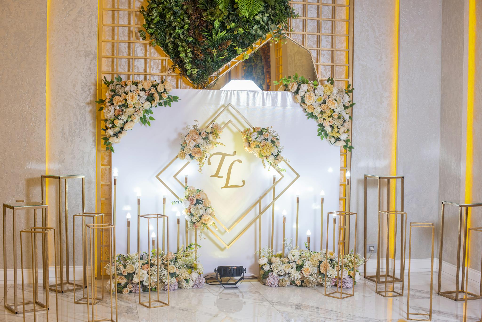 Sophisticated wedding setup with floral arrangements and candles in Shemakha, Azerbaijan.